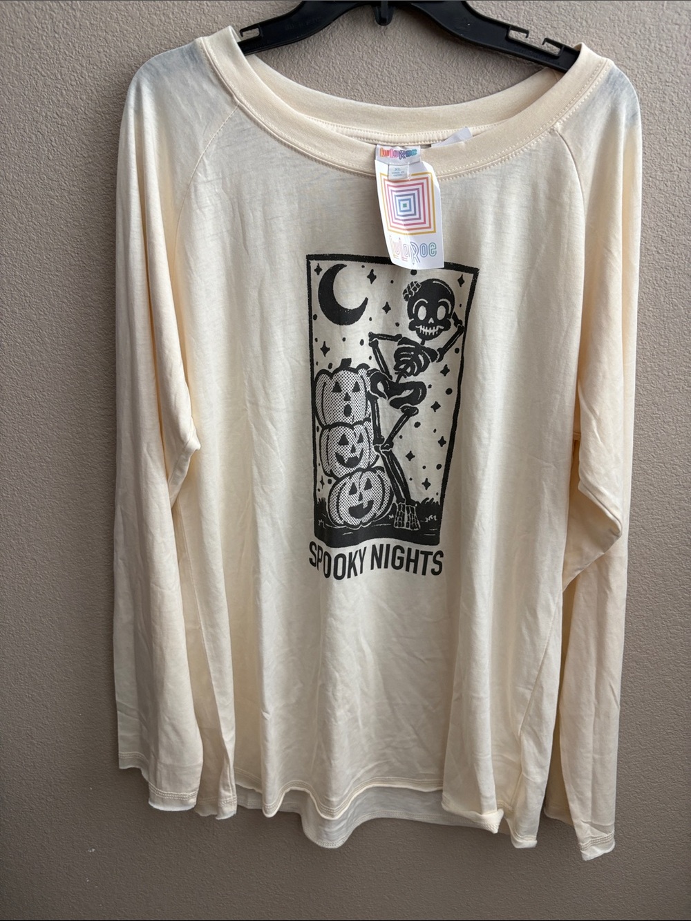 LuLaRoe Cream Long Sleeve Top with Black Halloween Graphic